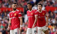 爱游戏教练-曼联攻守兼备：整体实力赢得掌声